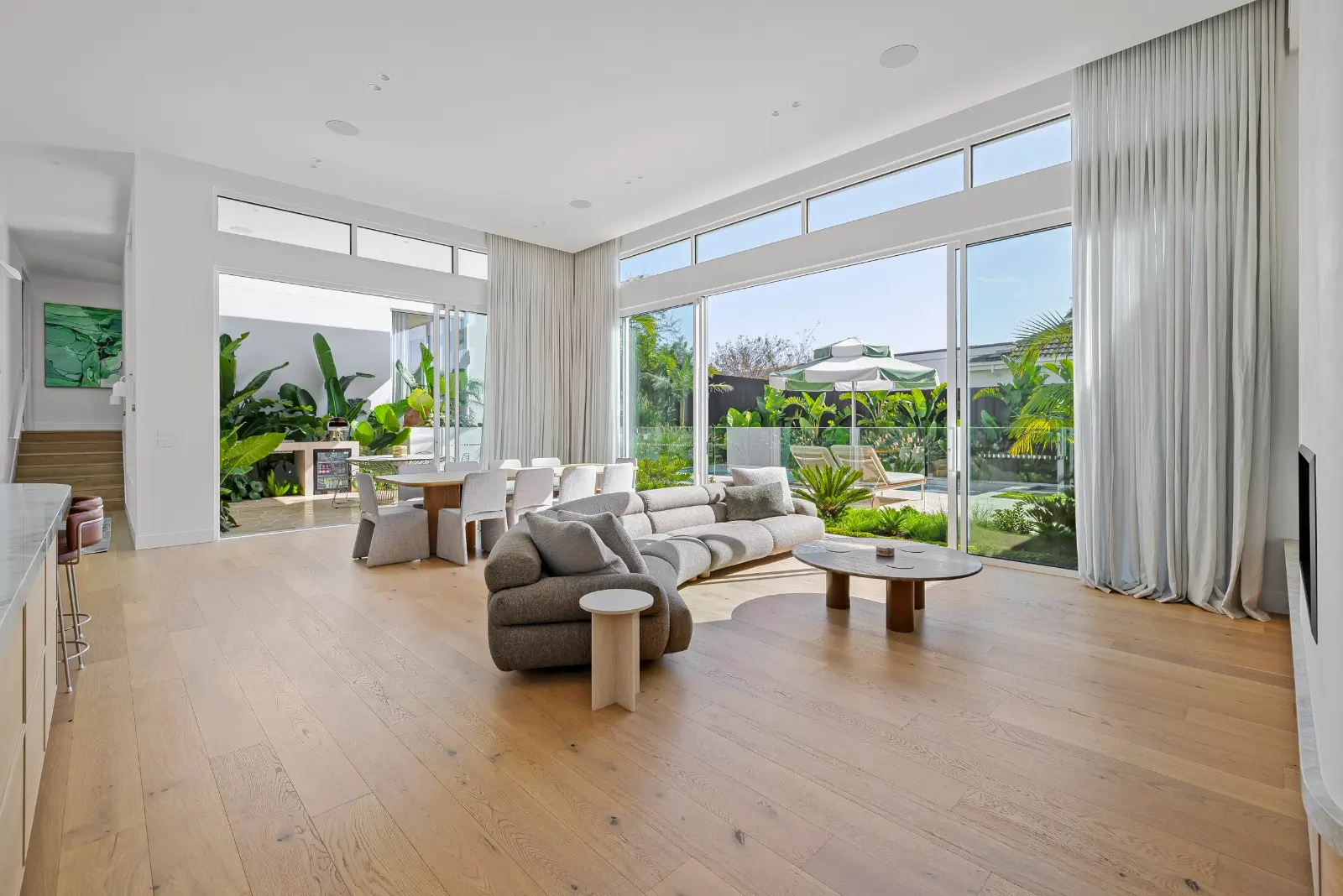 Glasshouse, Mount Eliza. Living room across the full glazed wall.