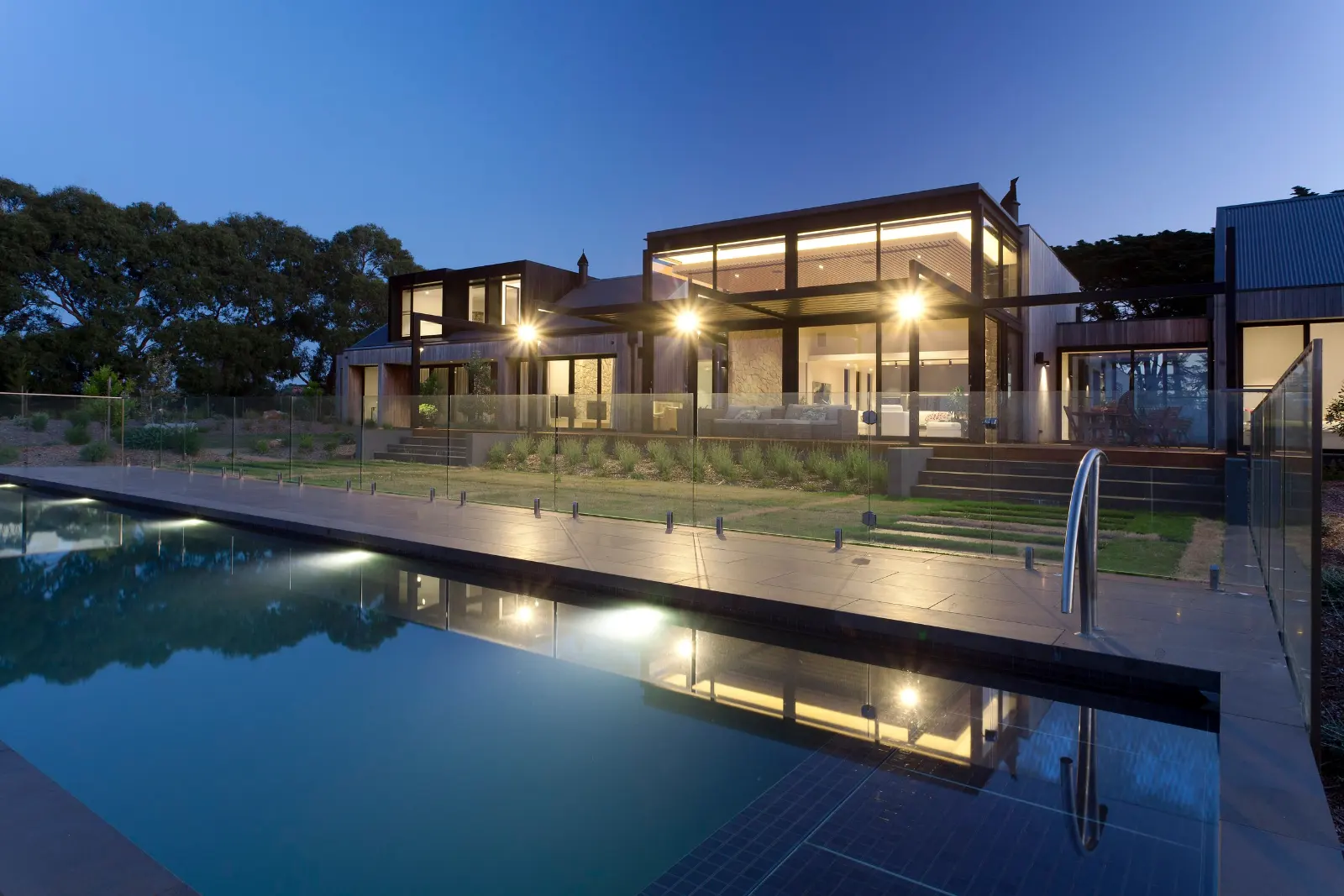 The Range, Red Hill. Pool and house at dusk.